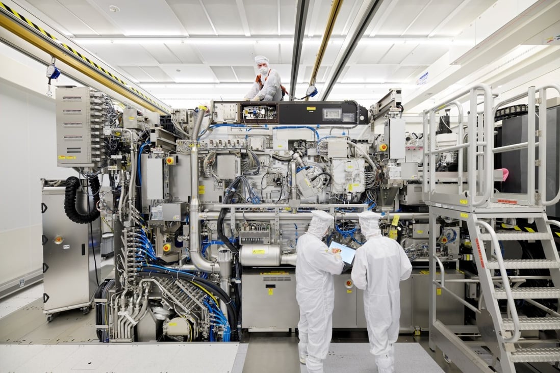 Employees work on the final assembly of a lithography machine at ASML in Veldhoven, Netherlands. In the advanced extreme ultraviolet (EUV) segment, ASML is the only viable player. Photo: Reuters