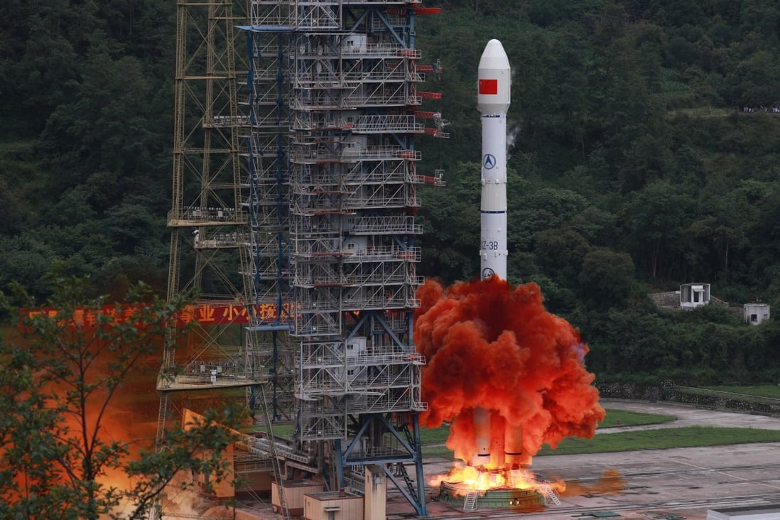 A carrier rocket carrying the last probe for China’s BeiDou satellite navigation system blasts off on Tuesday. Photo: Xinhua