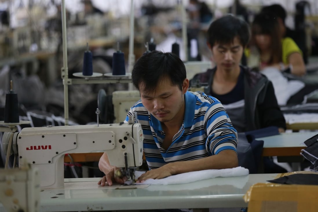 Sewing workers in a garment factory that exports to Europe, the United States and Japan, in Jiujiang city of Jiangxi province on February 29, 2020. Photo: Shutterstock