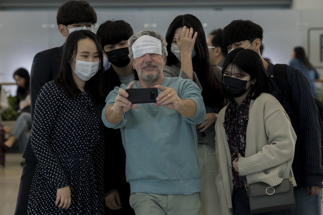 Alain Chabat (centre) stars as a French chef stranded at Seoul’s Incheon airport in a scene from #Iamhere (category: IIA, French), directed by Eric Lartigau.
