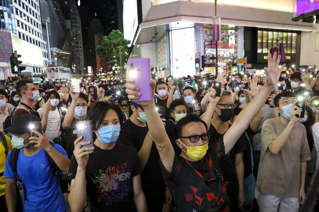 Protesters mark the one-year anniversary of the anti-government movement on June 12, 2020. Photo: Dickson Lee