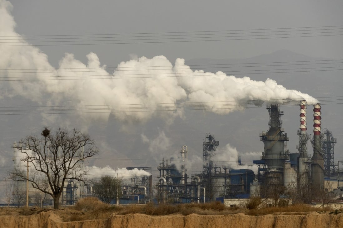 Smoke and steam rise from a coal processing plant in Hejin, in central China's Shanxi province, last November. Photo: AP