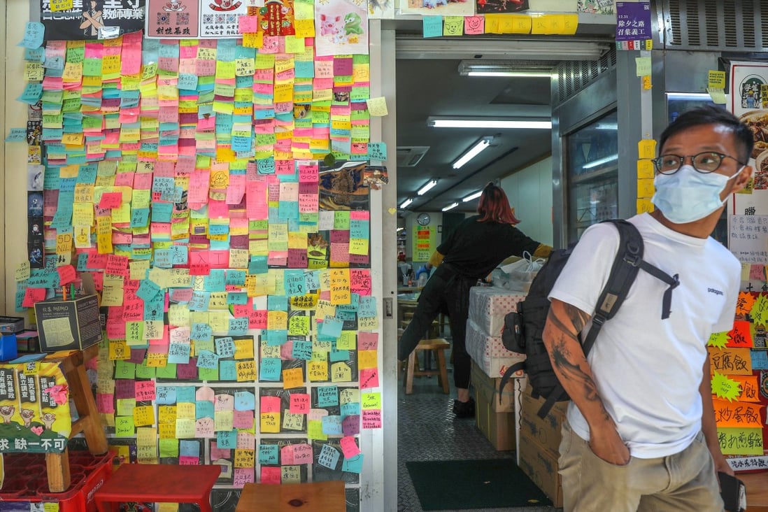 A cafe in Tsim Sha Tsui displays anti-government posters. Photo: Xiaomei Chen