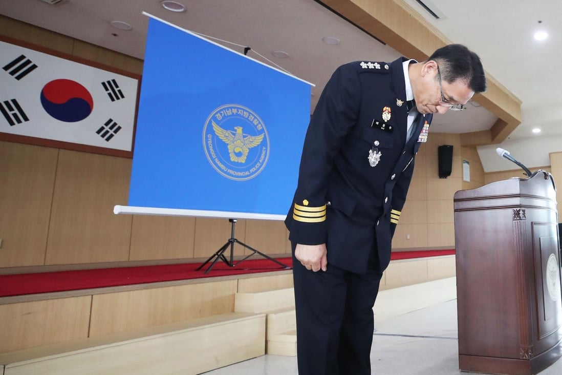 Provincial police chief Bae Yong-ju bows as he apologises for a botched, decades-long murder investigation that saw an innocent man jailed for 20 years for crimes committed by South Korea's most notorious serial killer Lee Chun-jae. Photo: AFP