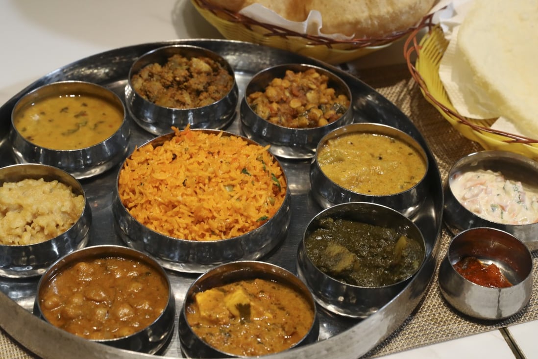 A thali from Woodlands Indian Vegetarian Restaurant in Tsim Sha Tsui, Hong Kong. A bowl of basmati rice is served with a variety of curries and other dishes. Photo: Edmond So