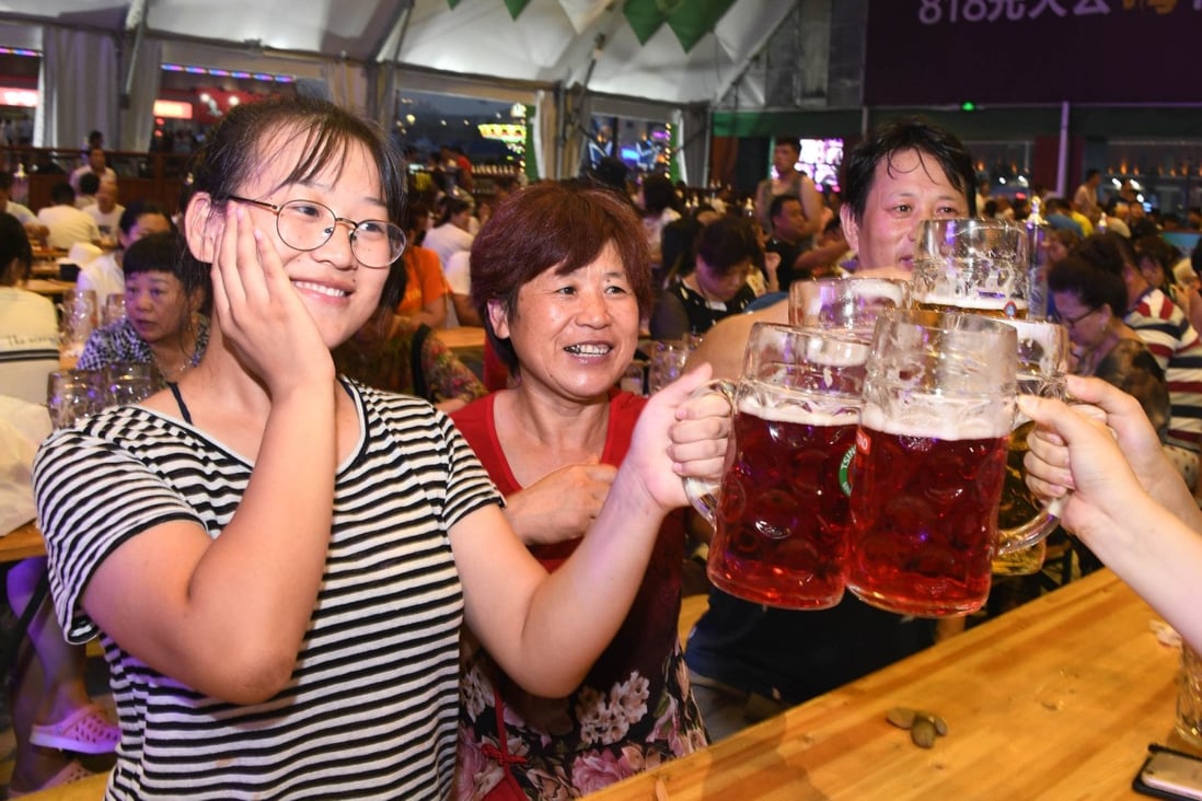 People at a beer-tasting event in China’s Shandong province in July 2018. Photo: Xinhua