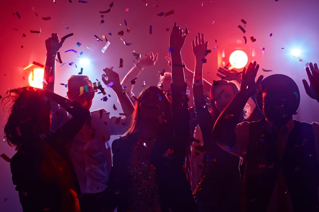 People dancing in a nightclub. Tuscaloosa officials said they originally did not think the “Covid-19 parties” were real. Photo: Shutterstock