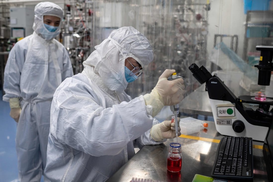 An engineer works on an experimental coronavirus vaccine at a laboratory in Beijing. Photo: AFP