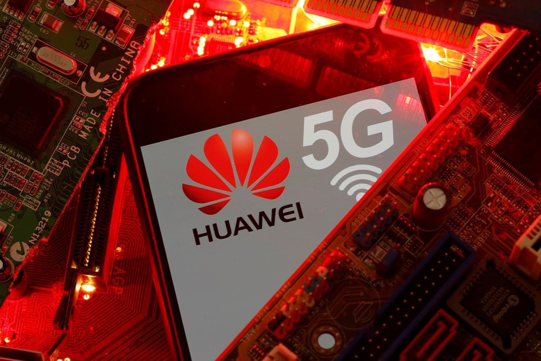 A smartphone with the Huawei and 5G network logo is seen on a PC motherboard in this illustration picture taken January 29, 2020. Photo: Reuters