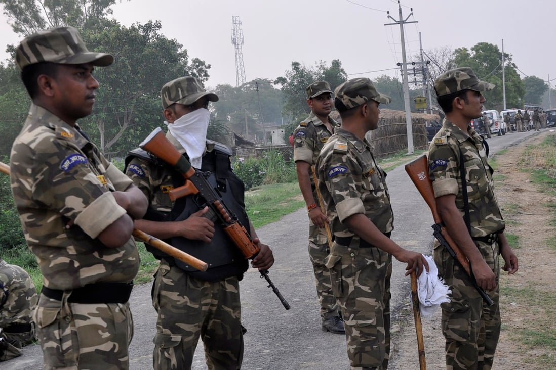 Indian policemen pictured in Uttar Pradesh state on July 3 amid the coronavirus pandemic. Photo: AFP