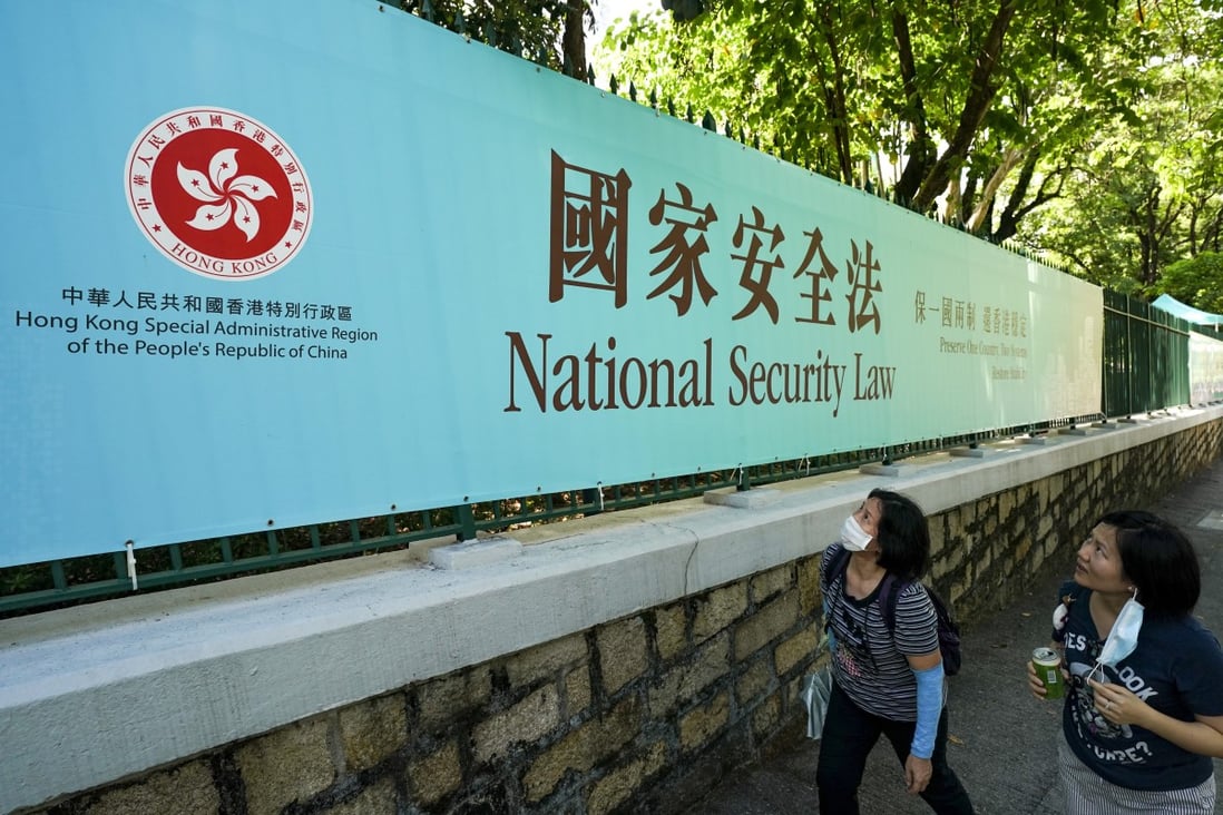 A banner advertises the national security law on Albany Road, Central. Photo: Felix Wong