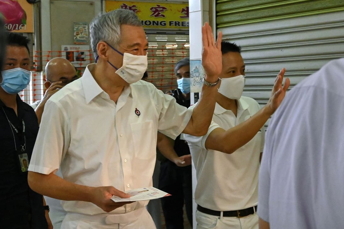 Singapore Prime Minister Lee Hsien Loong greets residents during a walkabout ahead of the general election. Photo: AFP