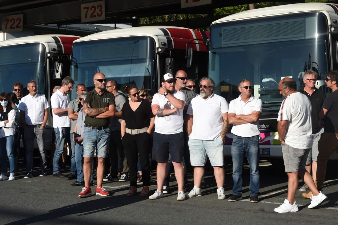 Bus drivers in Bayonne, southwestern France, wait for a visit by the junior transport minister on Tuesday, two days after a colleague was attacked for refusing to let a passenger board without a mask. Photo: AFP