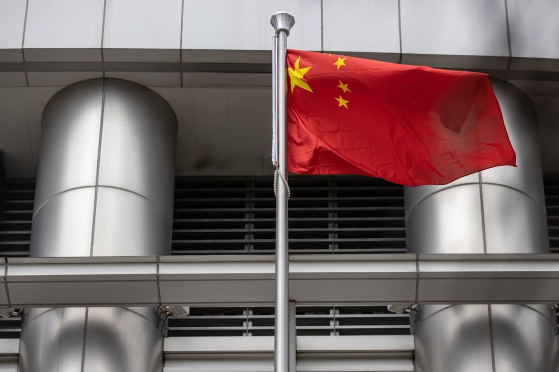 The Chinese flag is displayed outside Beijing’s Office for Safeguarding National Security in Causeway Bay, Hong Kong, on July 9, in the wake of the adoption of a new national security law for the city. Even if the law’s bark is a lot worse than its bite, the thought of being arrested and tried in court could deter some from speaking their mind. Photo: EPA-EFE