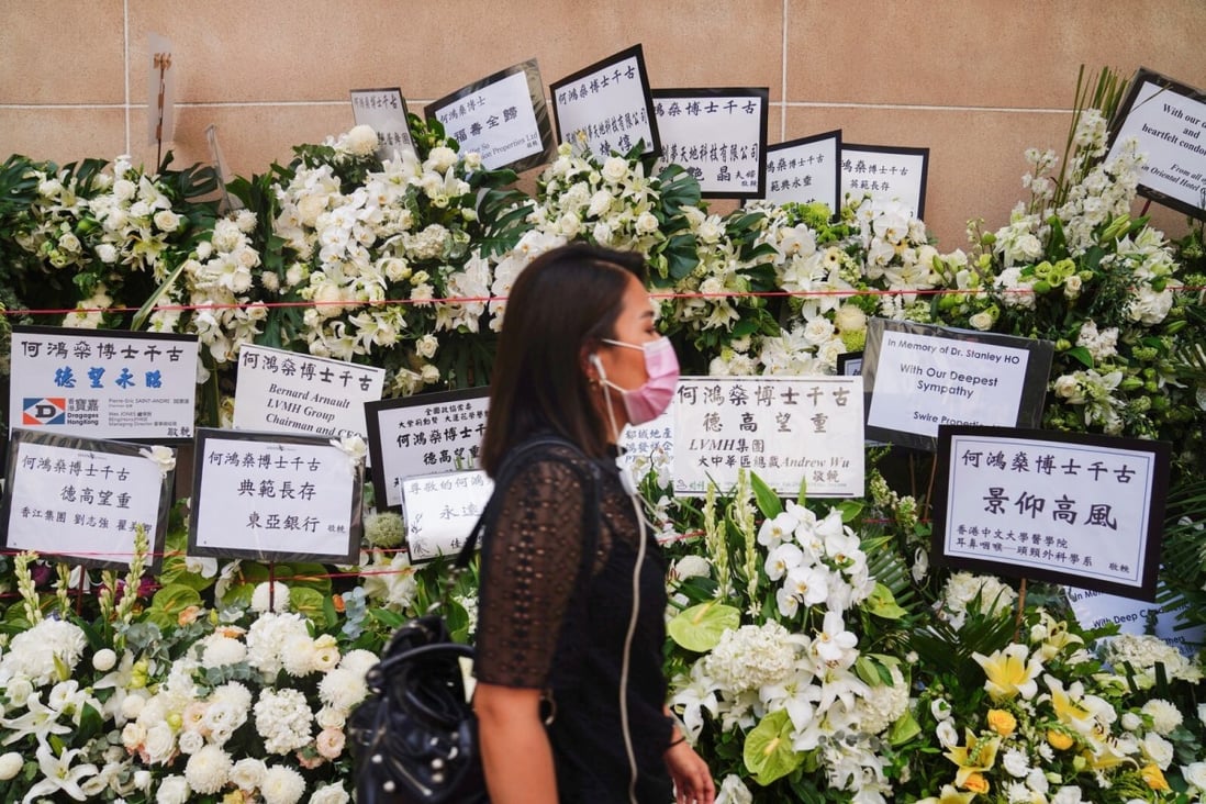 Flowers line the path outside Hong Kong Funeral Home ahead of the service for gambling magnate Stanley Ho. Photo: Sam Tsang