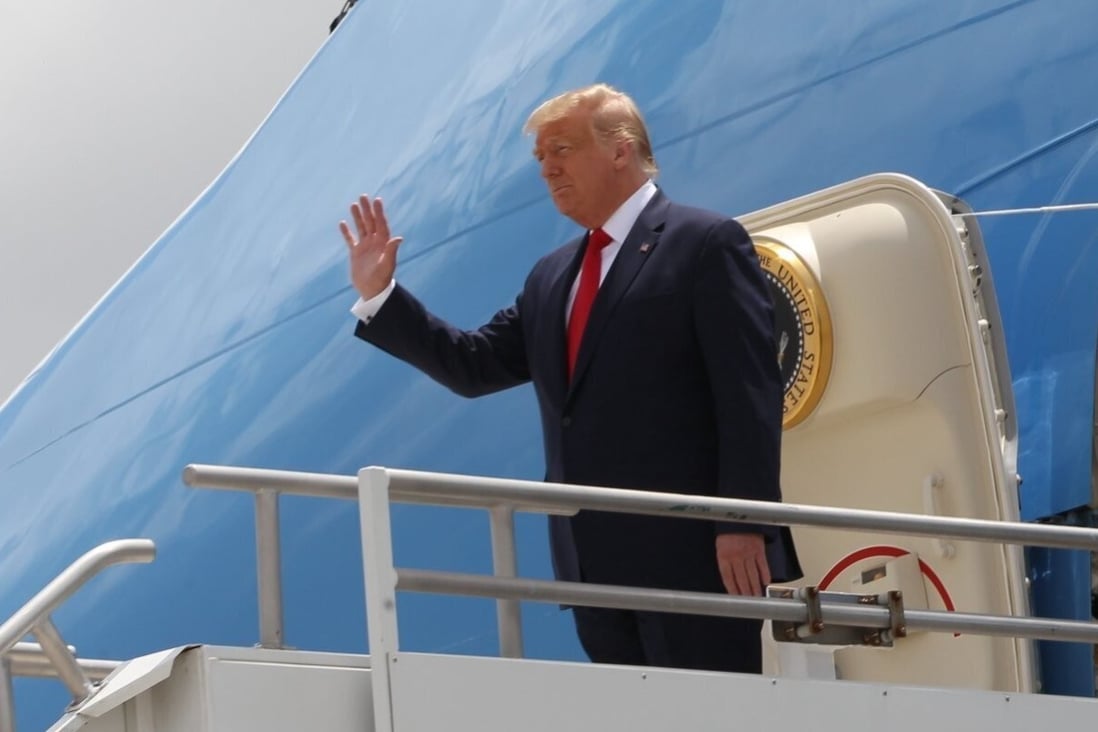 Donald Trump arrives at Miami International Airport on Friday. Photo: Miami Herald via AP