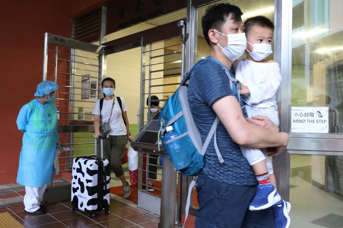 Some close contacts of Covid-19 patients being evacuated from a public housing estate in Sha Tin on Friday. Photo: May Tse