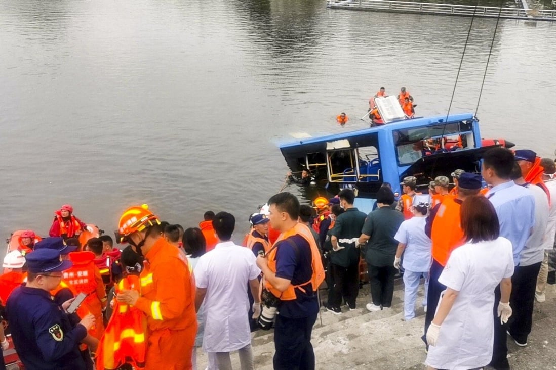 Emergency workers attend the scene of a fatal bus crash in Anshan, Guizhou province, on Tuesday. Photo: Weibo