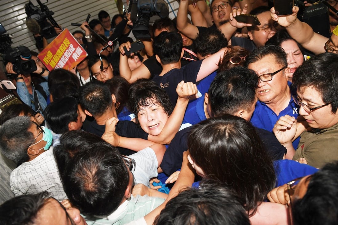 Fighting breaks out on Tuesday as Taiwan’s opposition party moves to occupy the island’s parliament. Photo: CNA