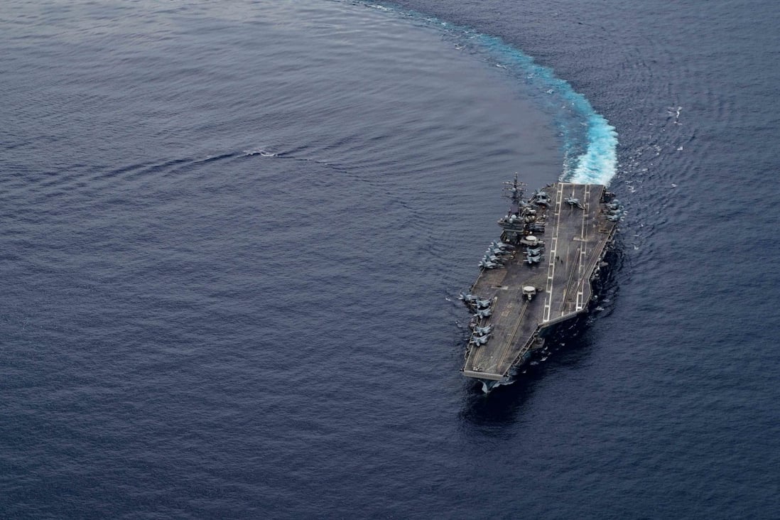 Aircraft carrier USS Ronald Reagan travels through international waters while conducting routine flight operations on July 4. Photo: US Navy via EPA-EFE
