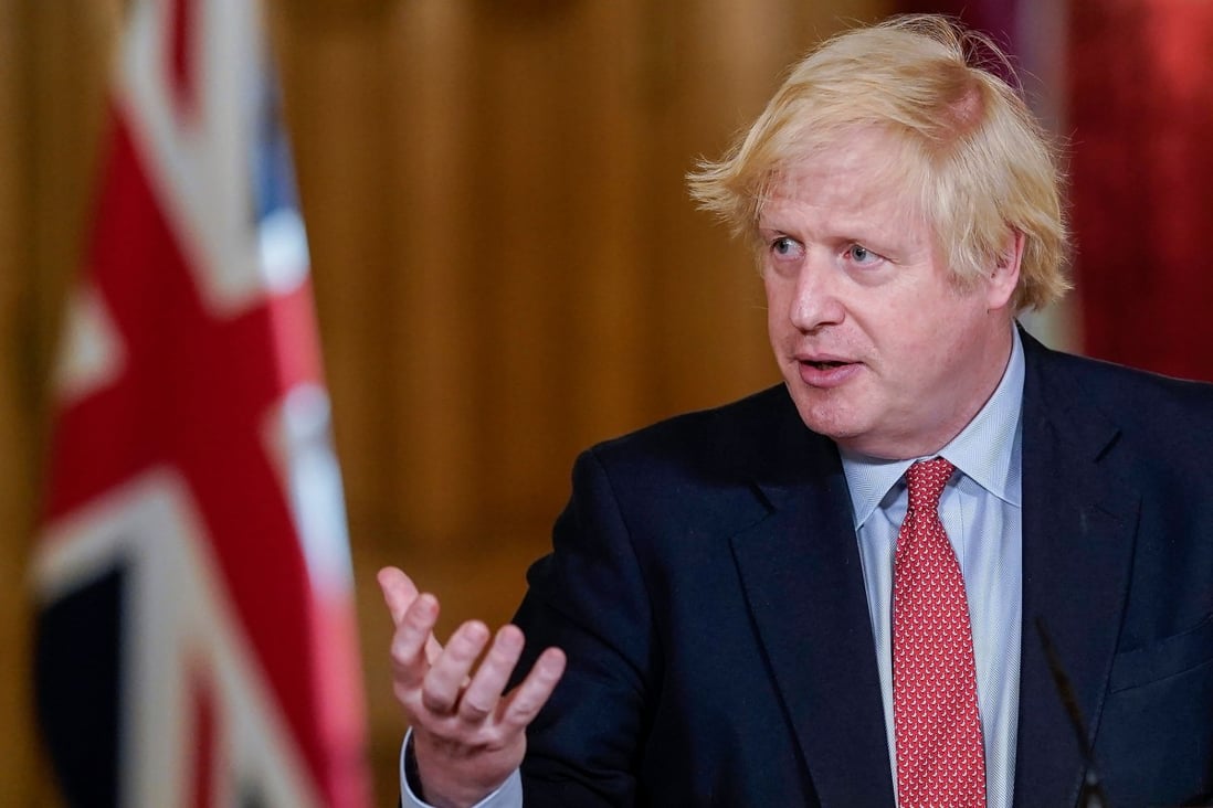 Britain's Prime Minister Boris Johnson speaks during a press conference at 10 Downing Street in May. Photo: 10 Downing Street via AFP