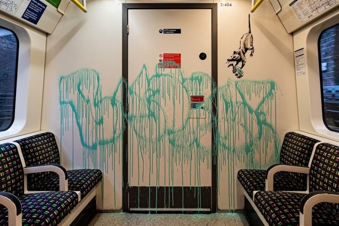 An artwork by Banksy is seen on a London Underground carriage. Photo: Reuters