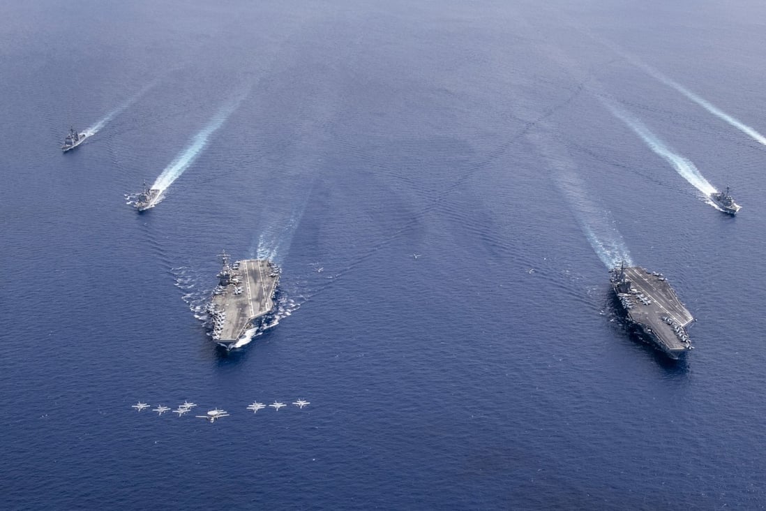 The US Navy’s Nimitz Carrier Strike Force conducts operations in the South China Sea on July 6. Photo: EPA