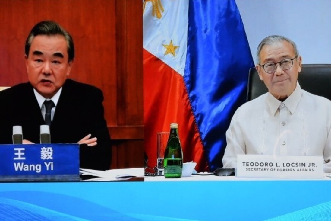 Philippine foreign secretary Teodoro Locsin Jnr and Chinese foreign minister Wang Yi during their video call. Photo: Handout