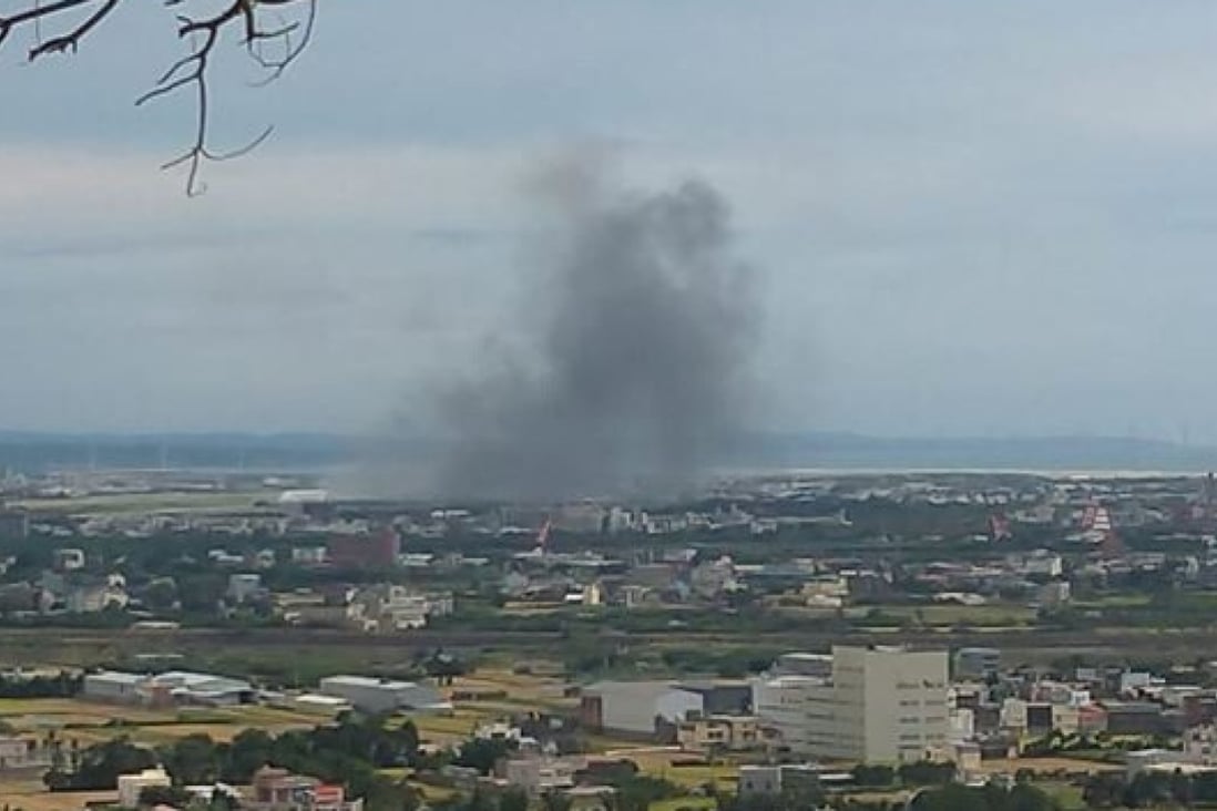 Smoke rises from the scene of the fatal crash at an air force base in Hsingchu. Photo: Facebook