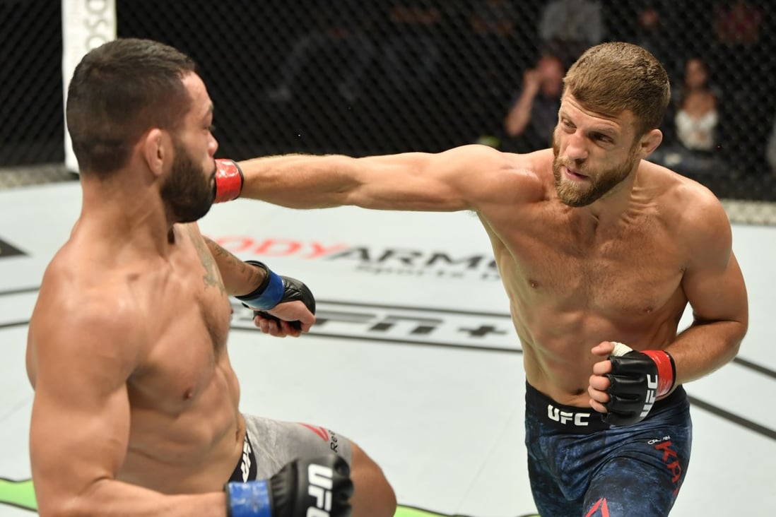 Calvin Kattar punches Dan Ige in their featherweight fight during the UFC Fight Night event inside Flash Forum on UFC Fight Island in Yas Island, Abu Dhabi. Photo: Jeff Bottari/Zuffa LLC via Getty Images