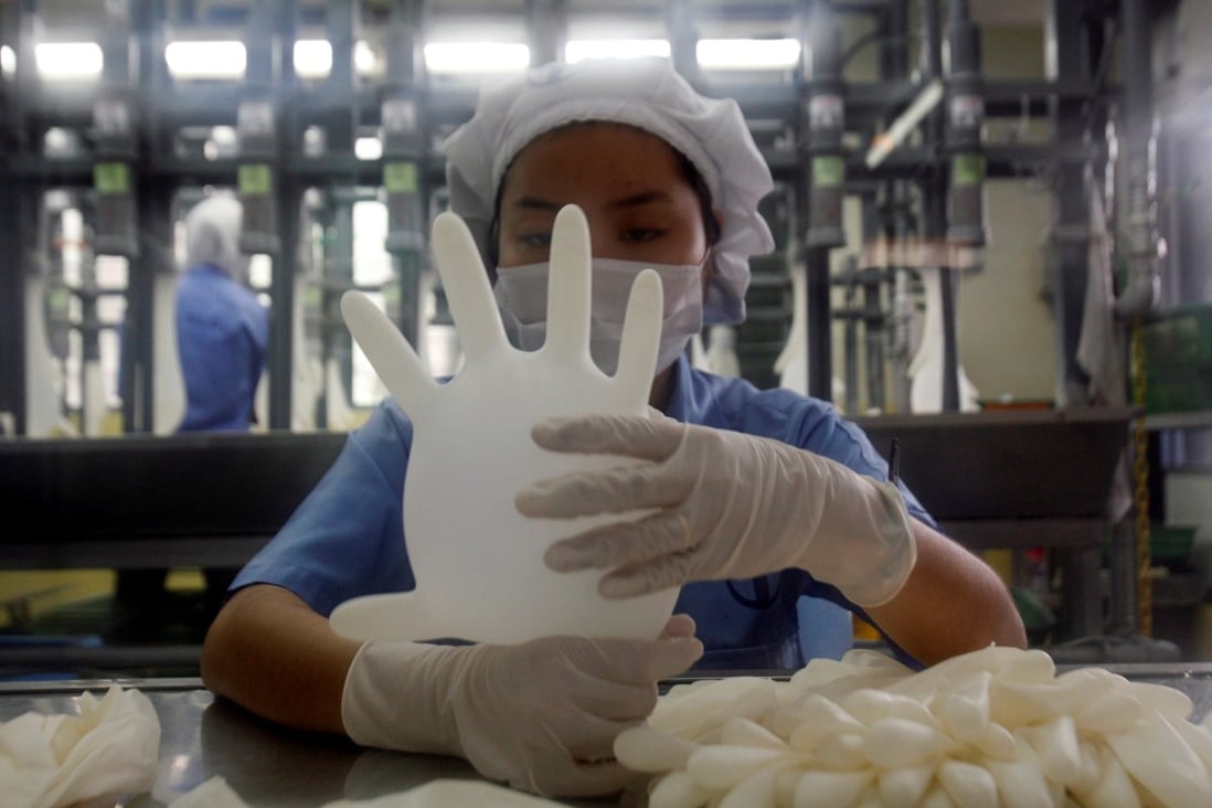US halts imports of Malaysia’s Top Glove over suspected forced labour