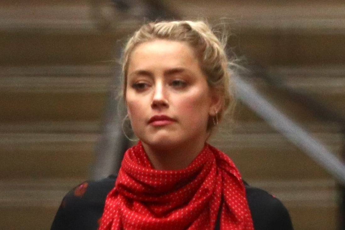 Actor Amber Heard leaves the High Court in London on Wednesday. Photo: Reuters