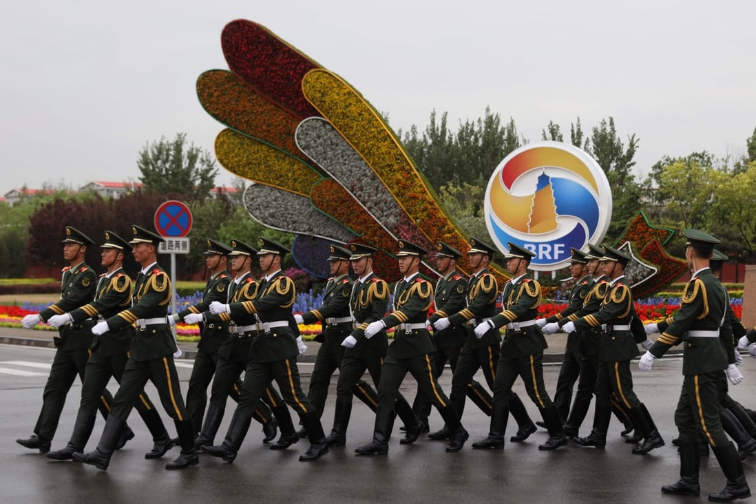 Chinese paramilitary police march outside the second Belt and Road Forum in Beijing last year. Photo: AFP
