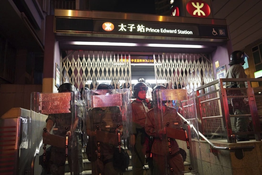 Police outside Prince Edward MTR station in Hong Kong on August 31 last year. Photo: AP