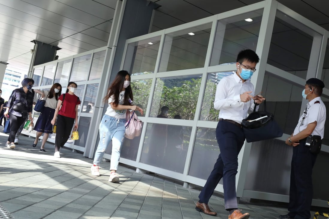 Civil servants return to the government headquarters in Tamar in May. Photo: Nora Tam