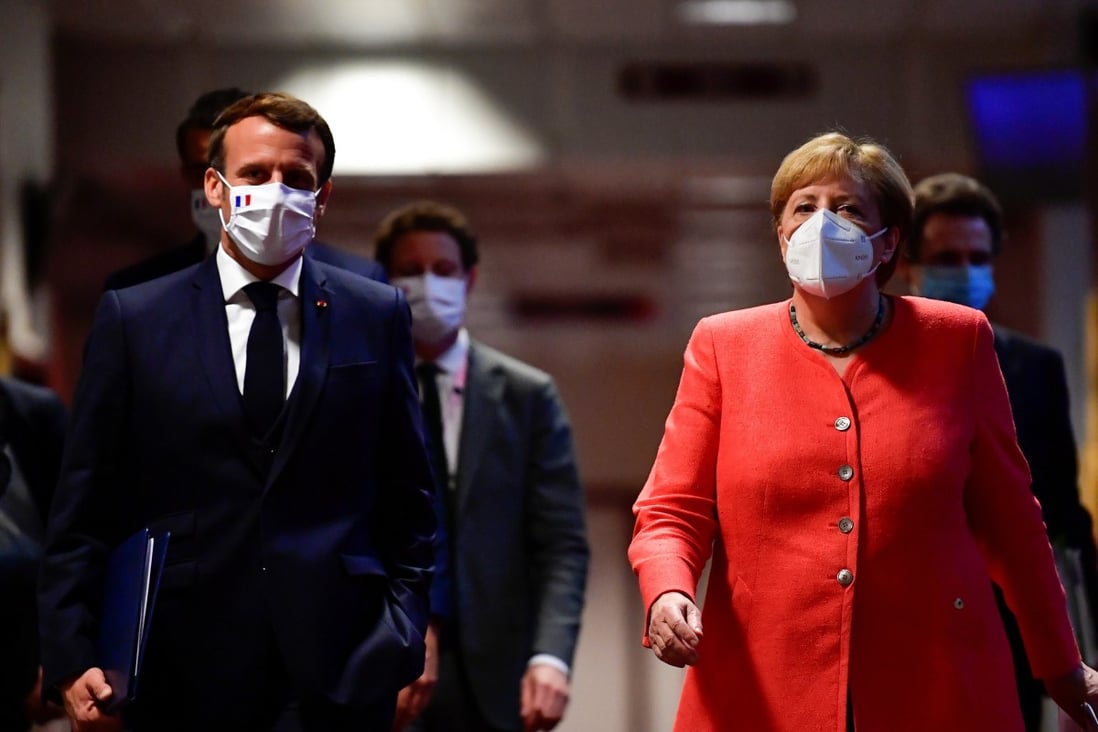 German Chancellor Angela Merkel (R) and French President Emmanuel Macron at the EU headquarters in Brussels. Photo: Reuters