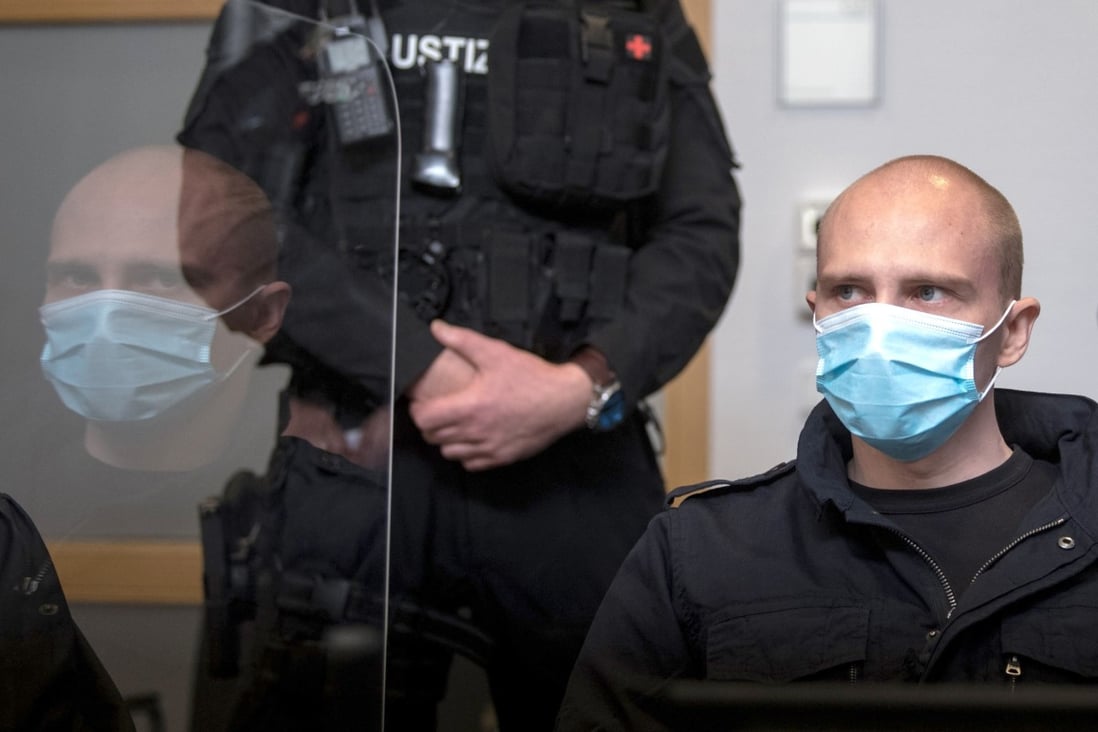 Accused Stephan Balliet sits in the regional court in Magdeburg, Germany before the start of his trial on Tuesday. Photo: dpa