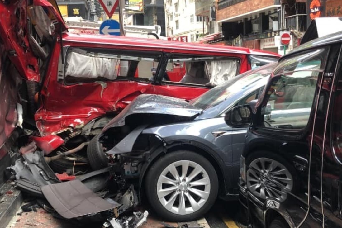 The Tesla crashed into two van parked on Blenheim Avenue in Tsim Sha Tsui. Photo: Jerry Shiu/Facebook