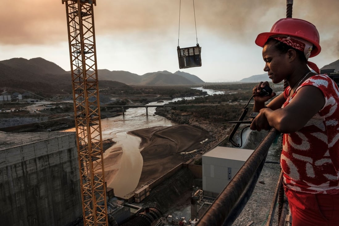 A radio operator looks out over the Grand Ethiopian Renaissance Dam in Ethiopia in December. Photo: AFP