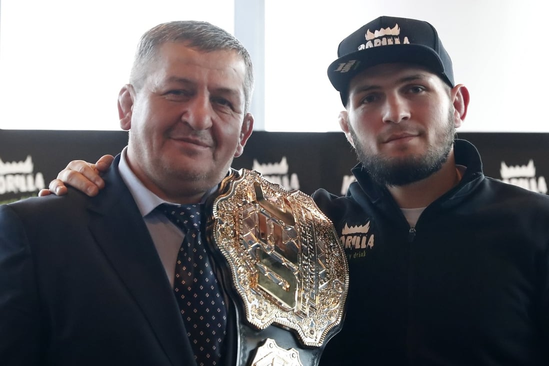 UFC lightweight champion Khabib Nurmagomedov and his father Abdulmanap in 2018. Photo: EPA