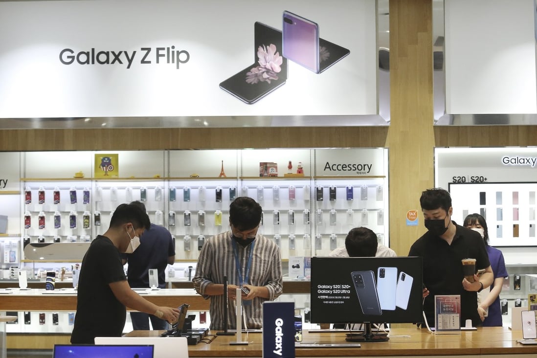 Visitors at a Samsung shop in Seoul, South Korea. Samsung will showcase its latest devices and strategies at an online event in August. Photo: AP/Ahn Young-joon