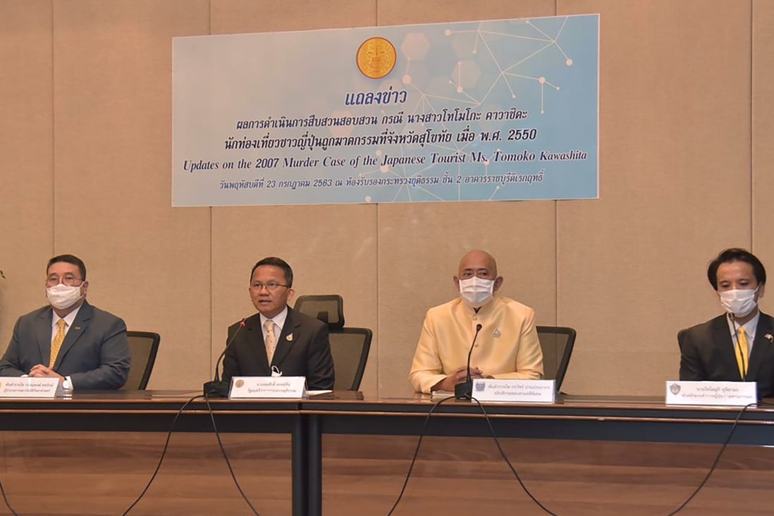 Thailand's Justice Minister Somsak Thepsuthin, second left, is seen at a press conference announcing updates in the investigation into the unsolved murder of a Japanese tourist 13 years ago. Photo: AP