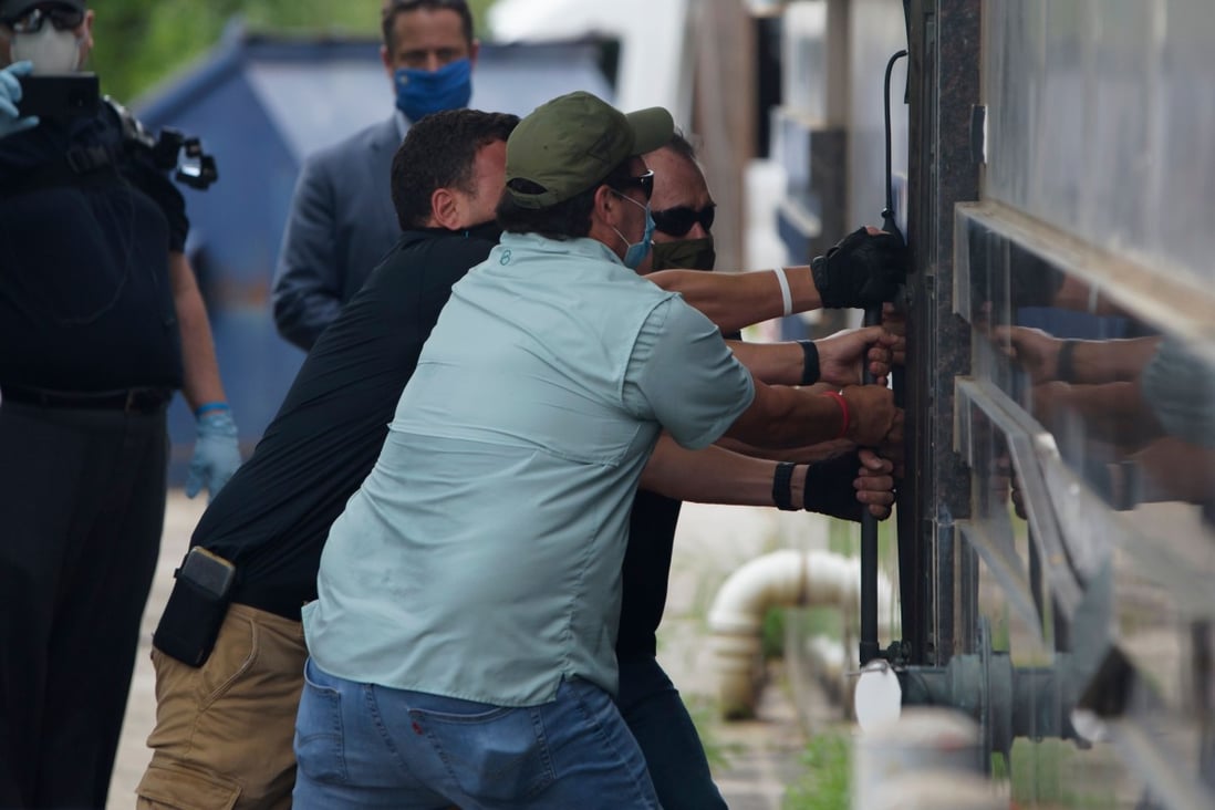 The back door of the consulate was forced open. Photo: AFP