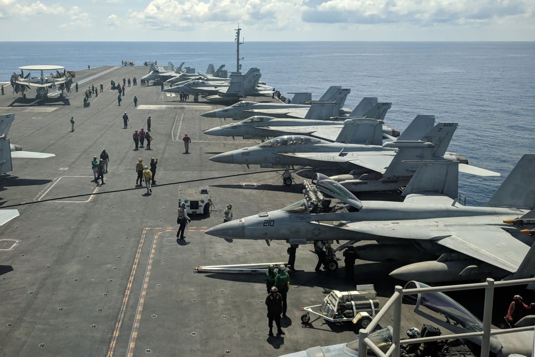 US military planes aboard the USS Ronald Reagan aircraft carrier as it sails in South China Sea on its way to Singapore in October 2019. Photo: AFP