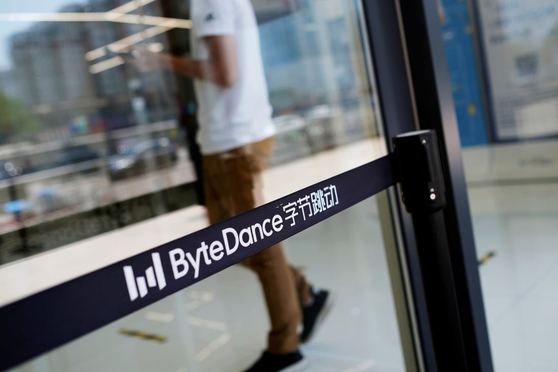 A man walks by a logo of Bytedance, the China-based company which owns the short video app TikTok, at its office in Beijing, July 7, 2020. Photo: Reuters