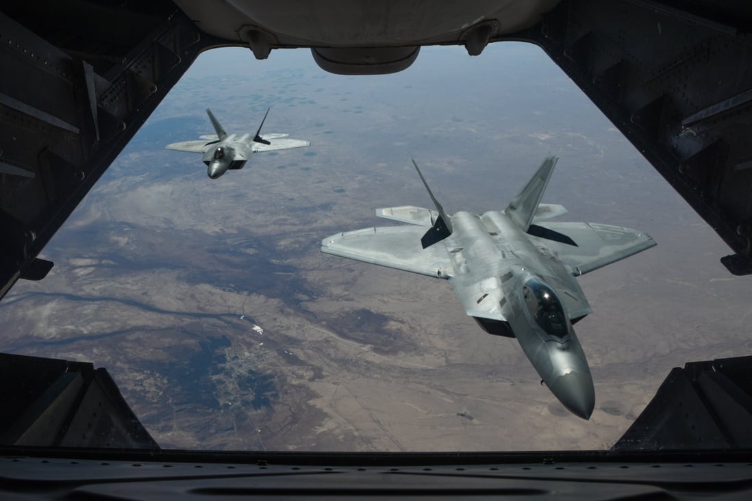 F-22 Raptors fly above Syria in 2018. A top Chinese aircraft designer says the US stealth fighters were designed for combat in Europe and could face challenges in the Asia-Pacific. Photo: EPA-EFE / US Air Force