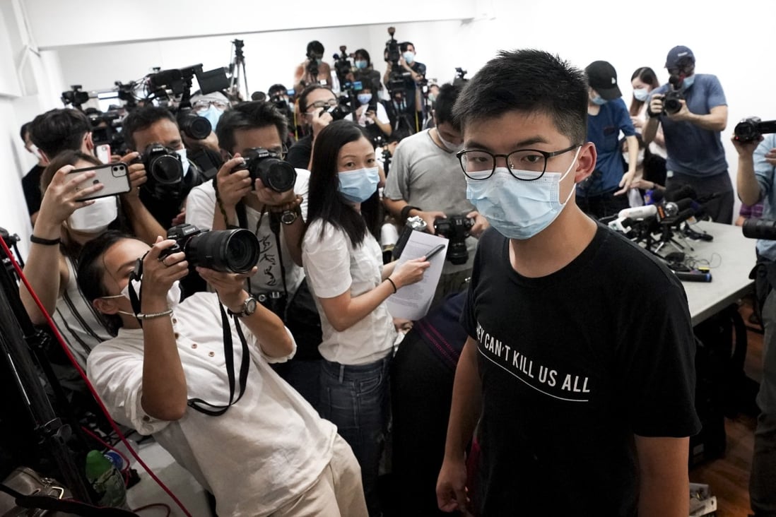 Hong Kong opposition activist Joshua Wong met with reporters on Friday to discuss his disqualification from the city’s Legislative Council elections. Photo: Felix Wong
