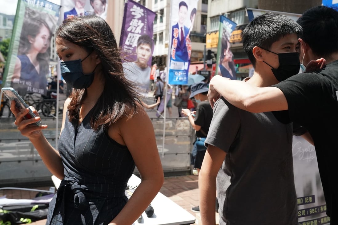 Gwyneth Ho (left) and Lester Shum are two of the 12 would-be opposition candidates disqualified from making a run at Legislative Council seats on Thursday. Photo: Felix Wong