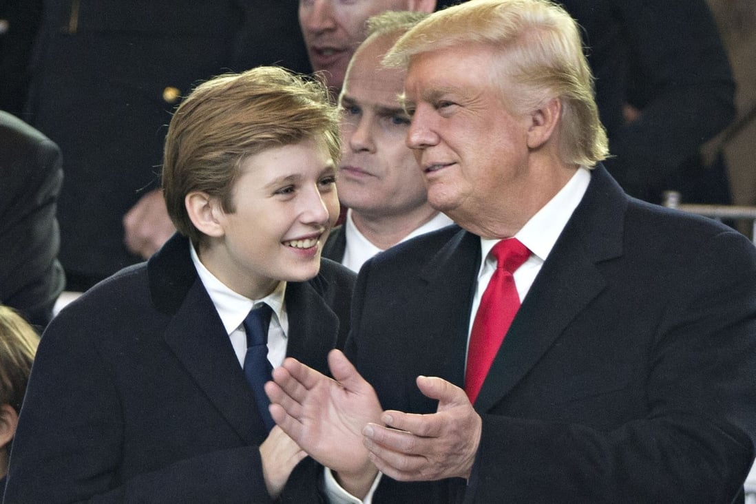 Like father like son, since this photo at Donald Trump’s inauguration in January 2017, Barron’s growth spurt has him towering over his famous dad. Photo: Bloomberg