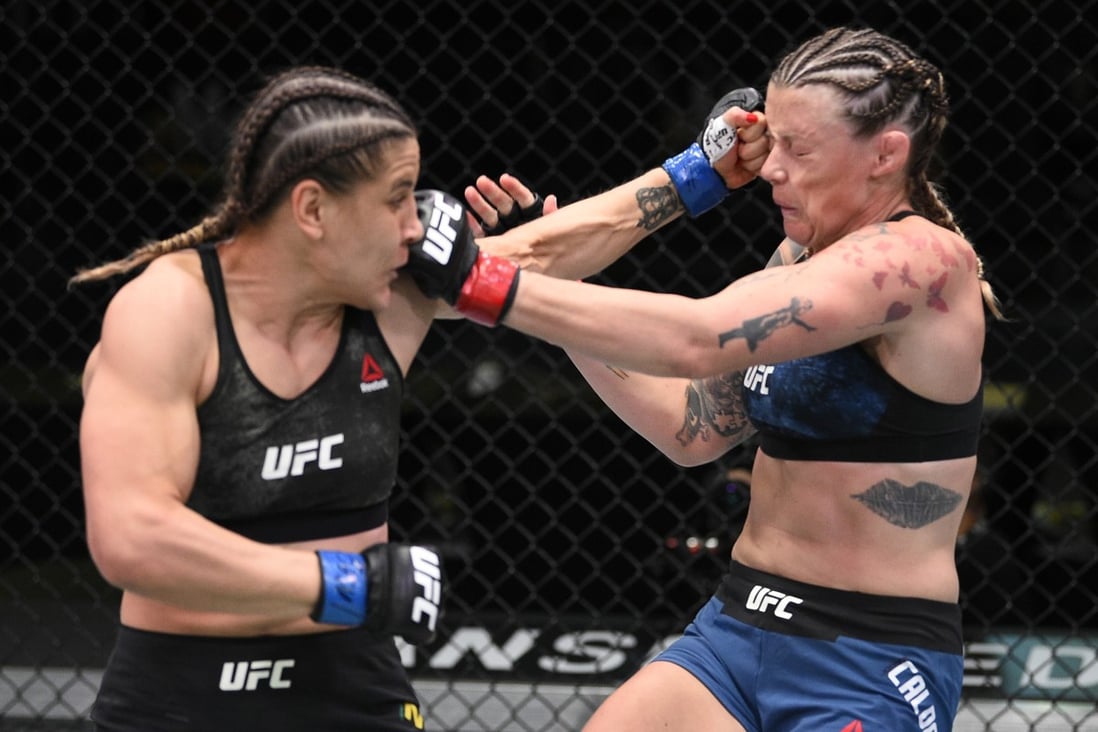 Jennifer Maia punches Joanne Calderwood in their flyweight fight during UFC Fight Night in Las Vegas. Photos: Chris Unger/Zuffa LLC via Getty Images